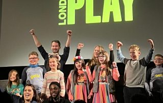 Markfield children, Ian Mccarthy and Dom Wicks on London PLay awards stage